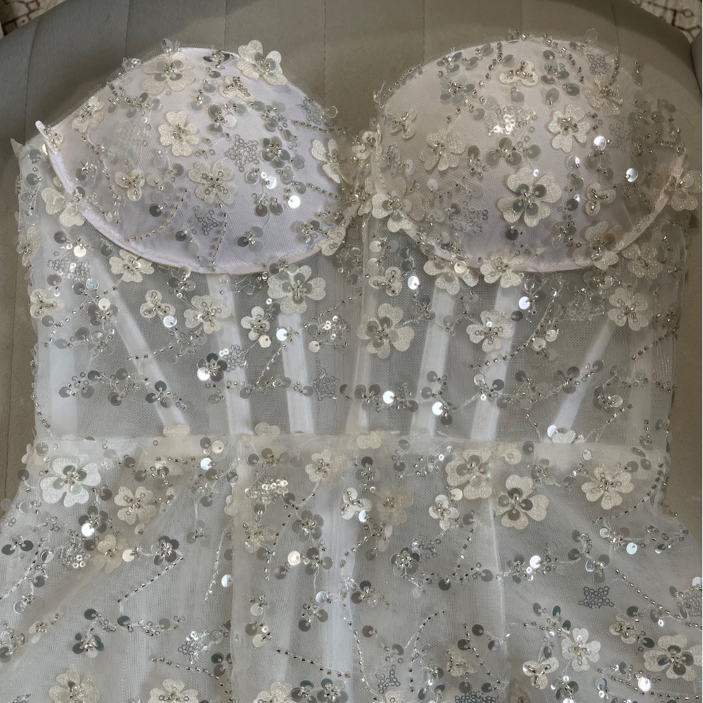 Mini sheer dress with flower detail